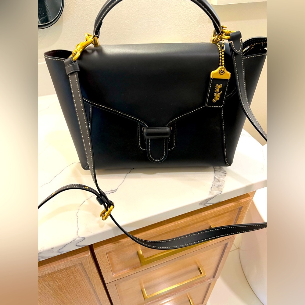 Coach (new, never used) top handle and crossbody black bag.